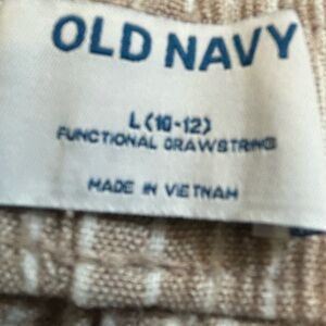 Girls shorts tan and white size large 10/12